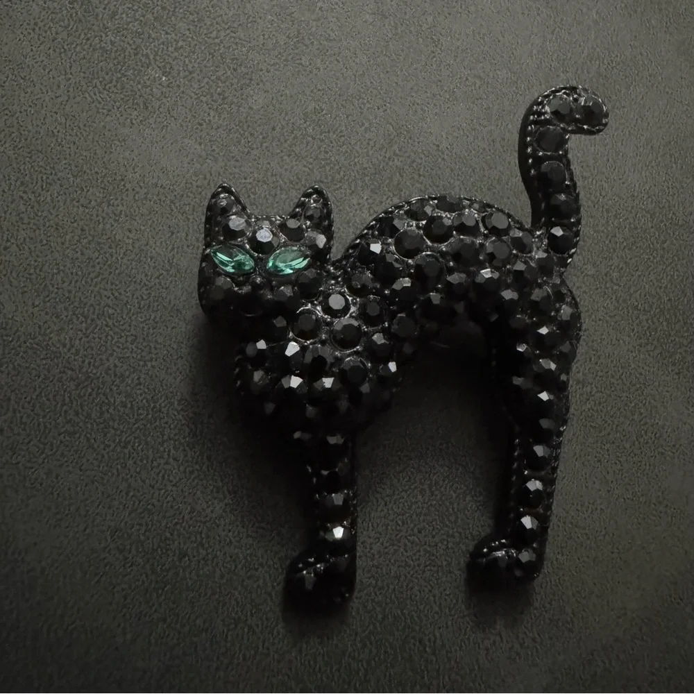 Monet Black Crystal Cat Pin with Emerald Green Eyes